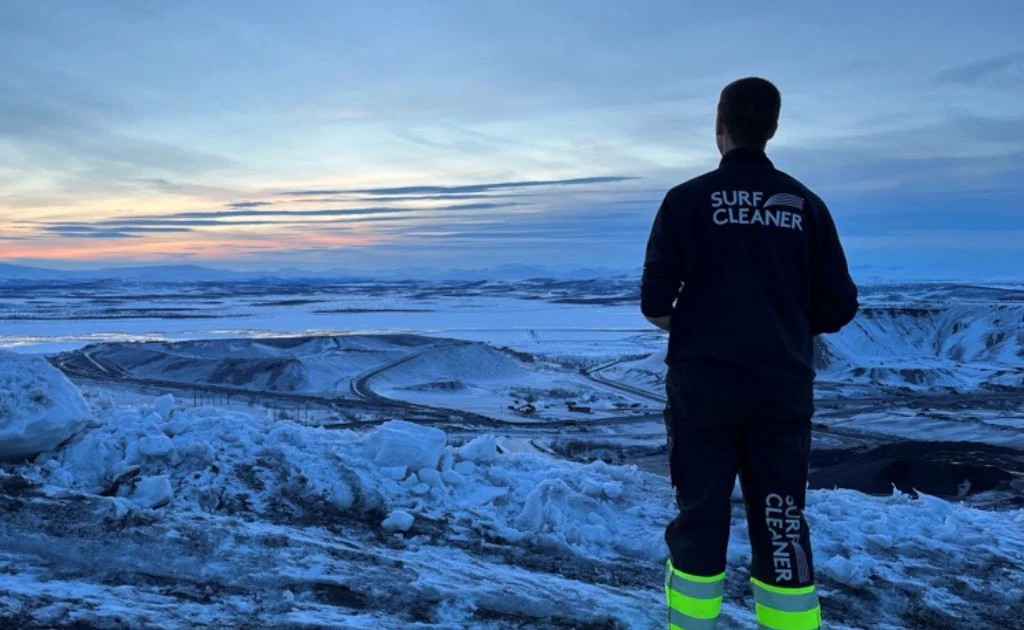 SurfCleaner Technician Overlooks Mining Operations