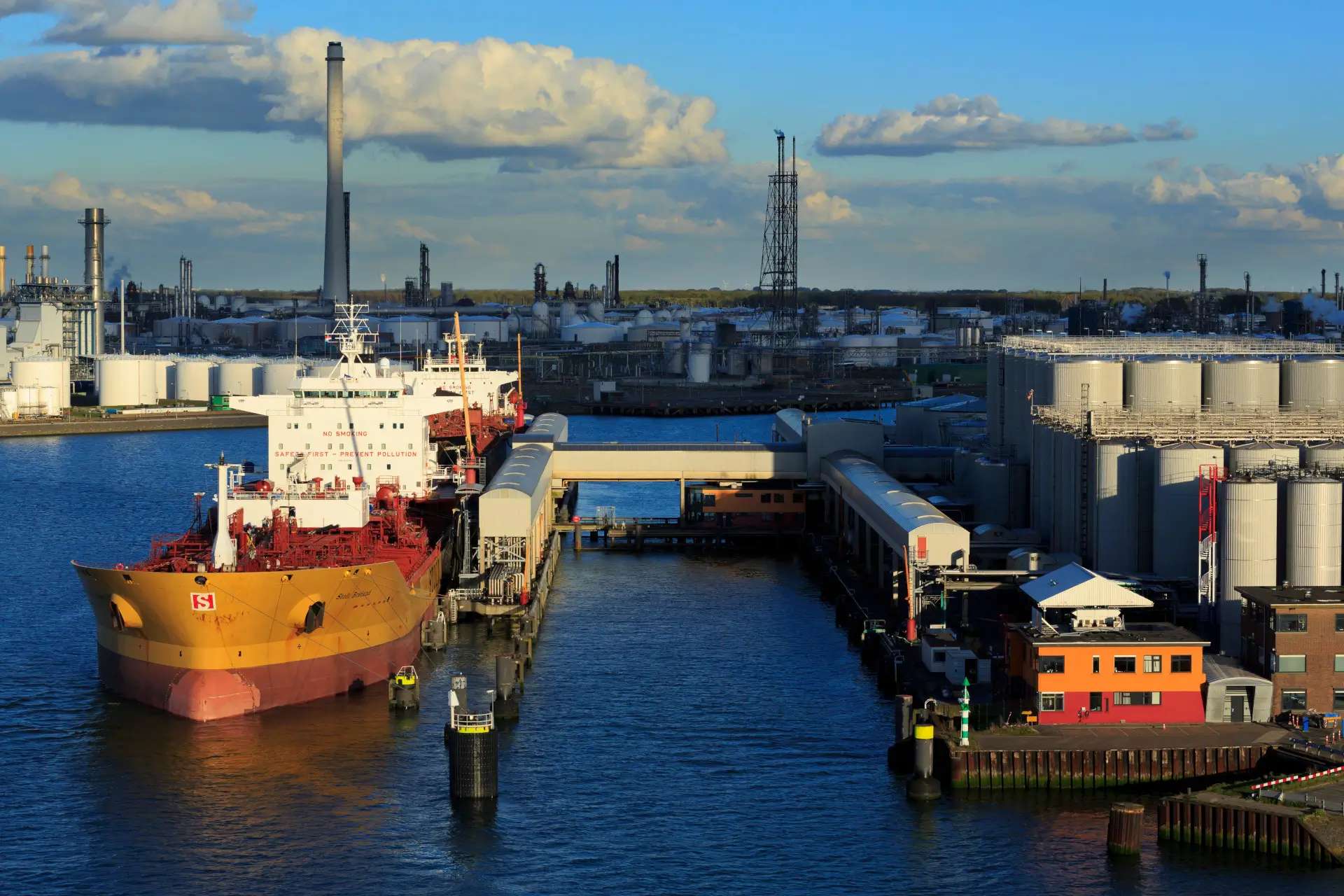 Oil Harbor at Port of Rotterdam with Oil Refinery and Oil Tanks.